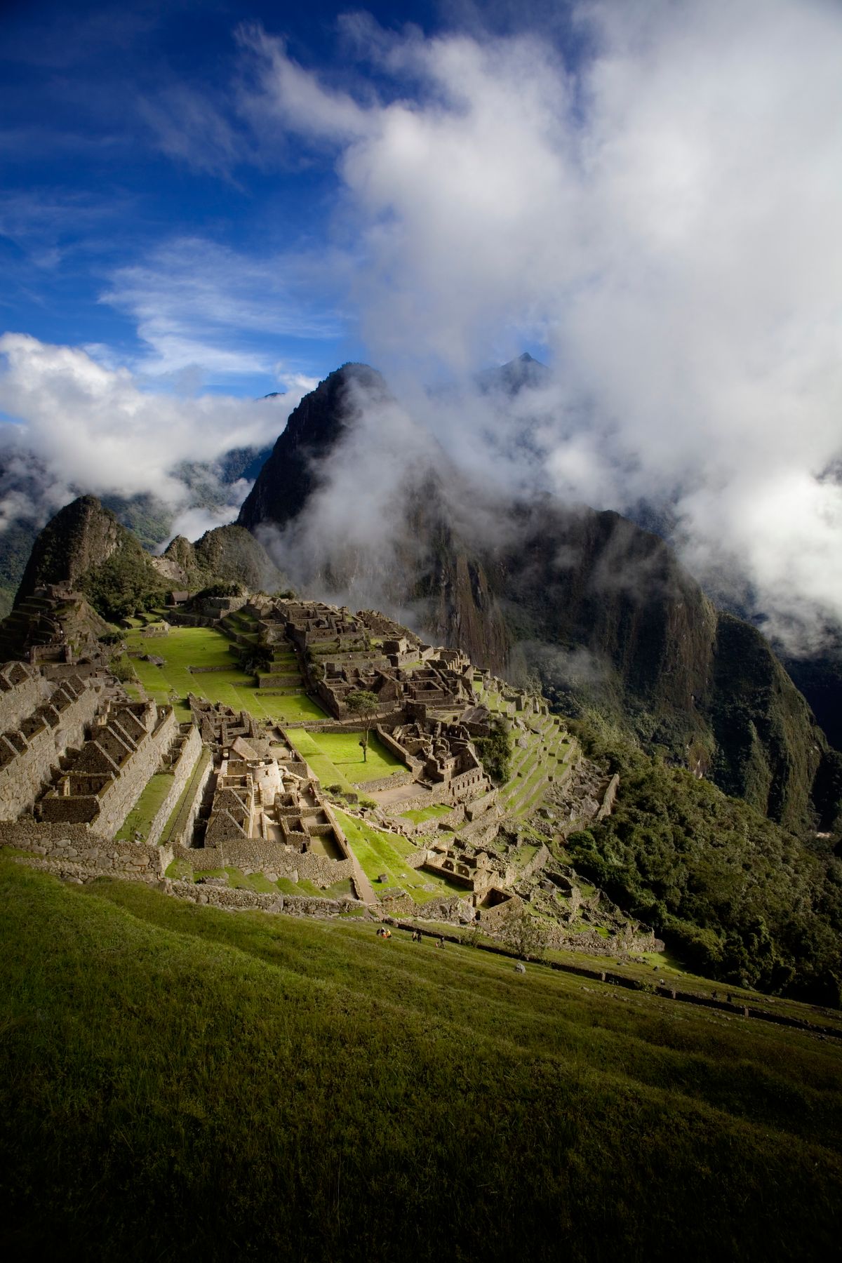 Machu Picchu rising through the clouds in the Peruvian Andes